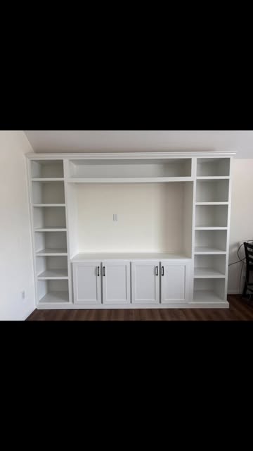 Custom white built-in cabinetry and shelving