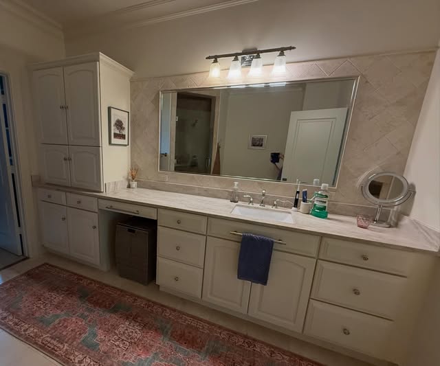 Finished bathroom vanity, mirror and lighting